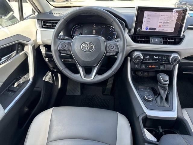 used 2024 Toyota RAV4 Hybrid car, priced at $29,998