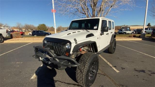 used 2013 Jeep Wrangler Unlimited car, priced at $19,990