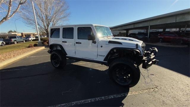 used 2013 Jeep Wrangler Unlimited car, priced at $19,990