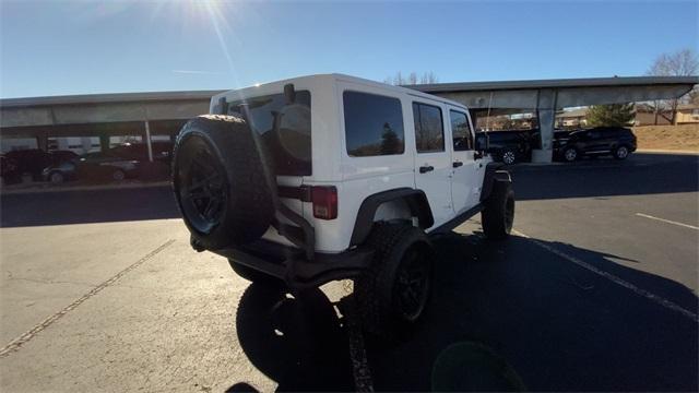 used 2013 Jeep Wrangler Unlimited car, priced at $19,990