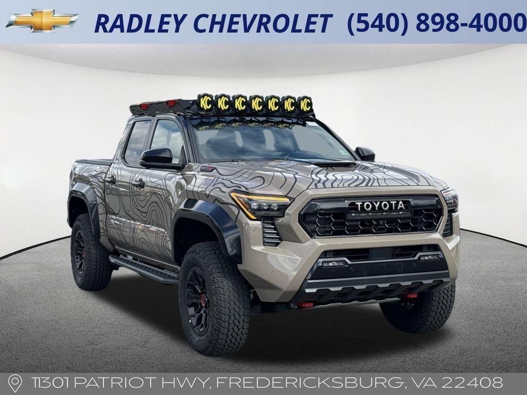 used 2025 Toyota Tacoma Hybrid car, priced at $60,000