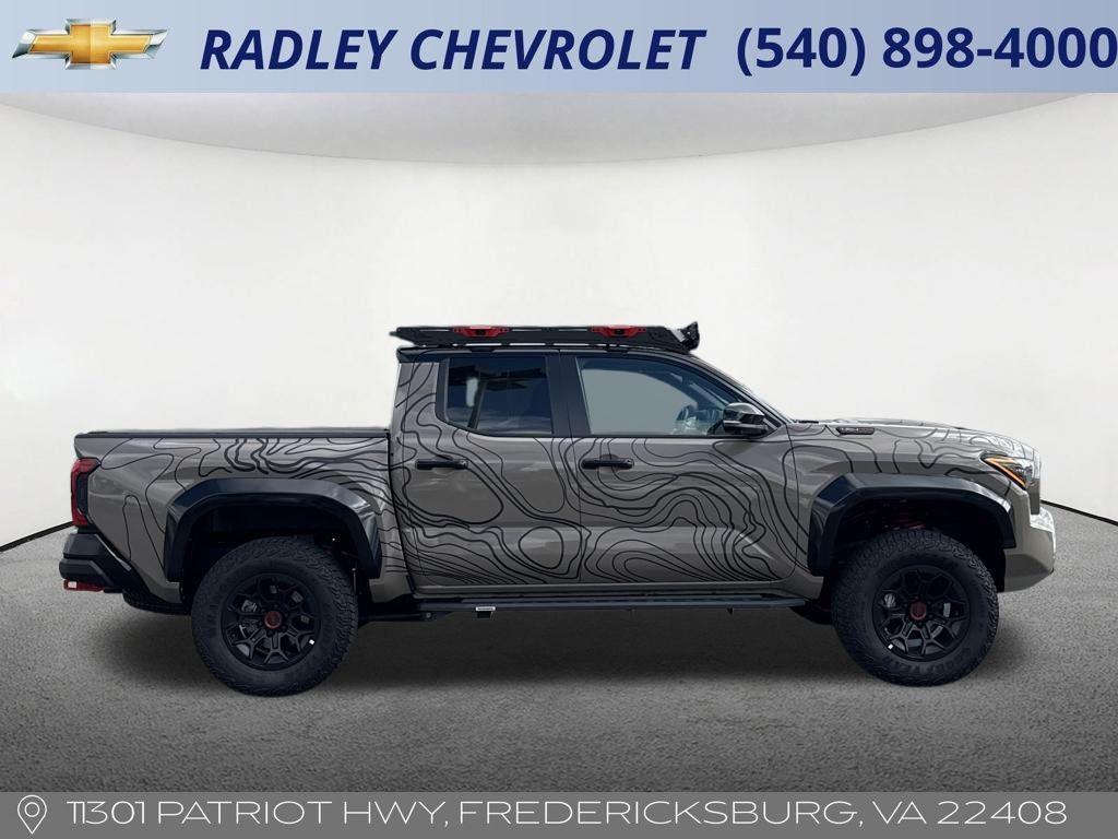 used 2025 Toyota Tacoma Hybrid car, priced at $60,000