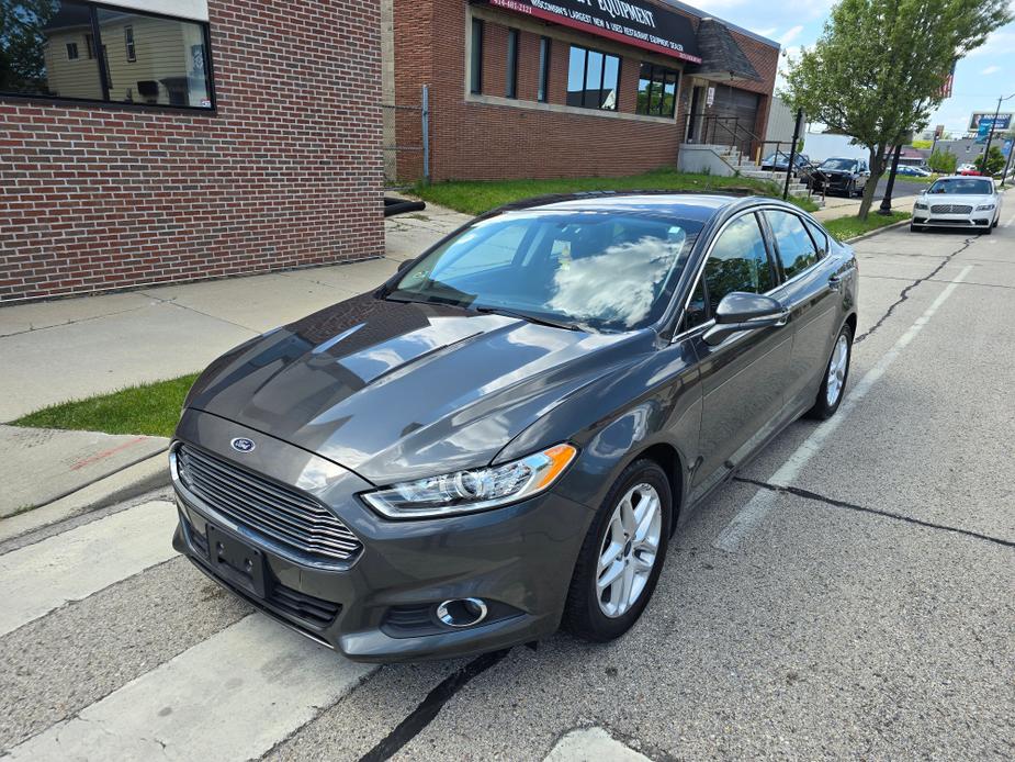 used 2016 Ford Fusion car, priced at $8,900