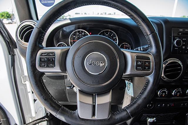 used 2018 Jeep Wrangler JK Unlimited car, priced at $22,997