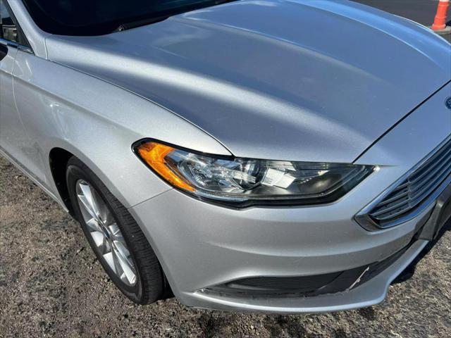 used 2017 Ford Fusion car, priced at $9,999