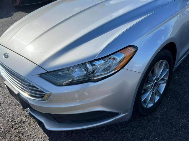 used 2017 Ford Fusion car, priced at $9,999