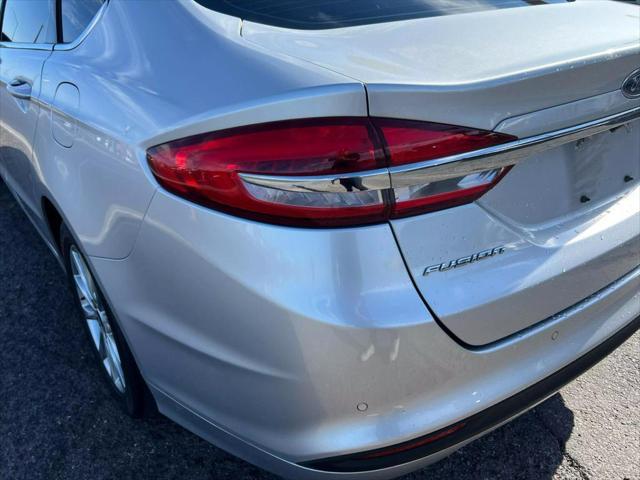 used 2017 Ford Fusion car, priced at $9,999