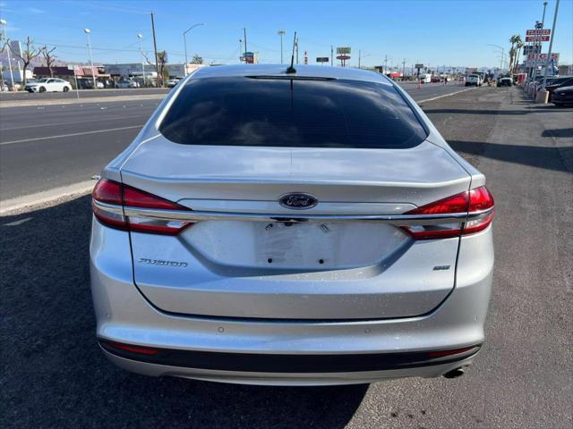 used 2017 Ford Fusion car, priced at $9,999