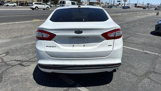 used 2016 Ford Fusion car, priced at $7,777