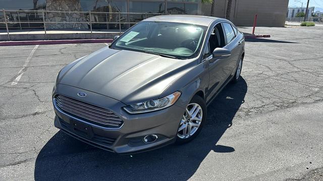 used 2014 Ford Fusion car, priced at $9,999