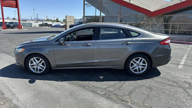 used 2014 Ford Fusion car, priced at $9,999