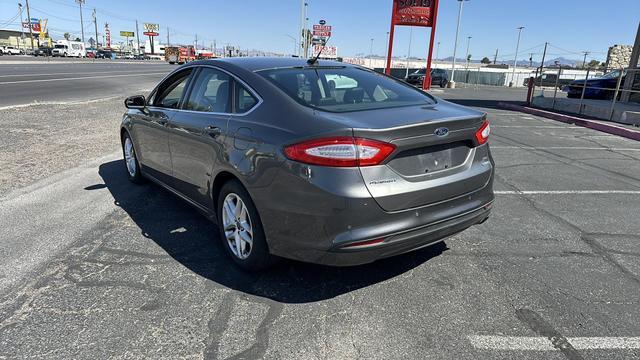 used 2014 Ford Fusion car, priced at $9,999