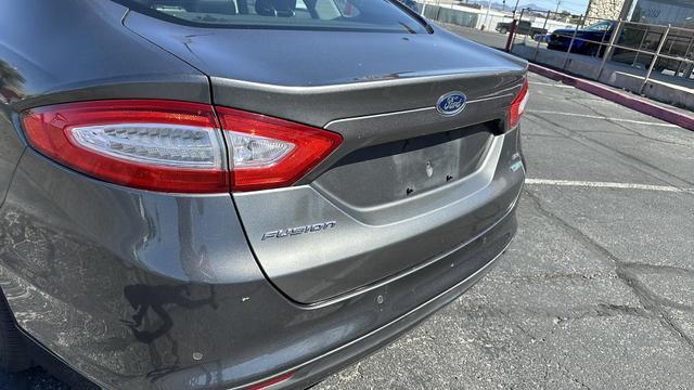 used 2014 Ford Fusion car, priced at $9,999