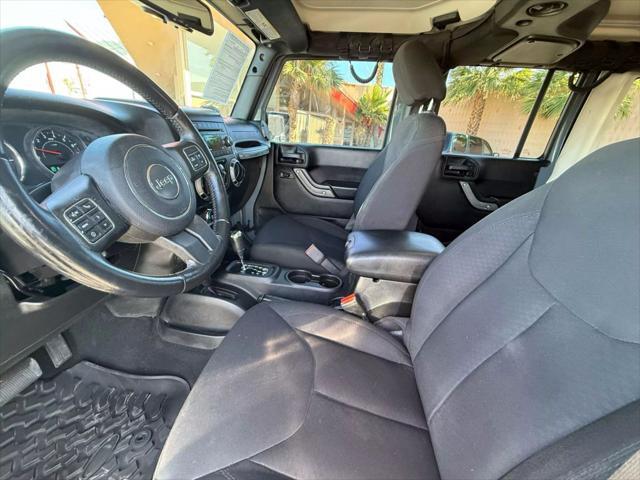 used 2015 Jeep Wrangler Unlimited car, priced at $19,799