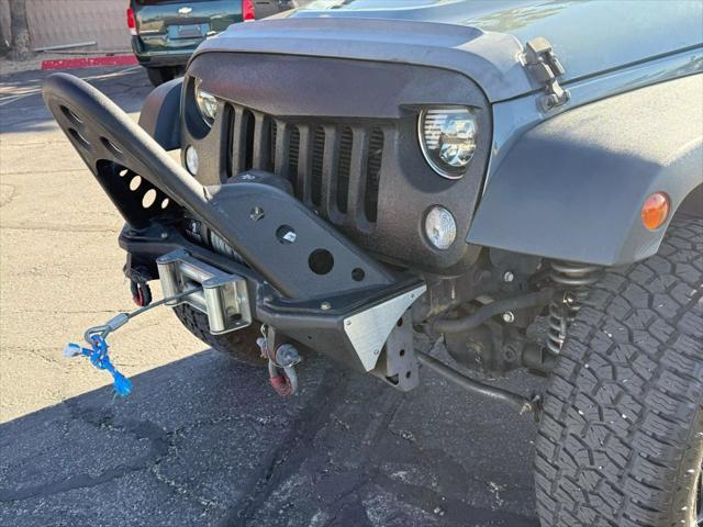 used 2015 Jeep Wrangler Unlimited car, priced at $19,799