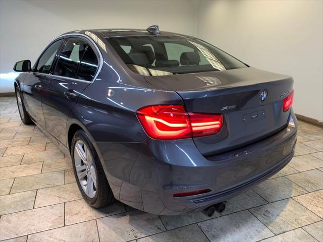 used 2018 BMW 330 car, priced at $18,477