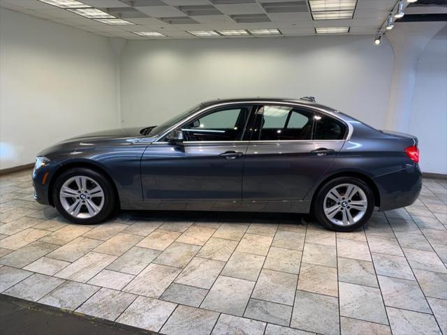 used 2018 BMW 330 car, priced at $18,477