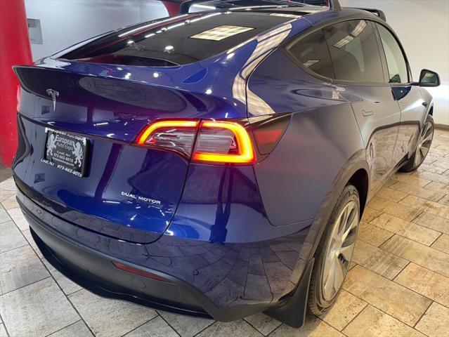 used 2023 Tesla Model Y car, priced at $27,977