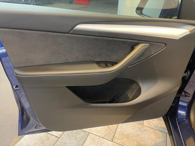 used 2023 Tesla Model Y car, priced at $27,977