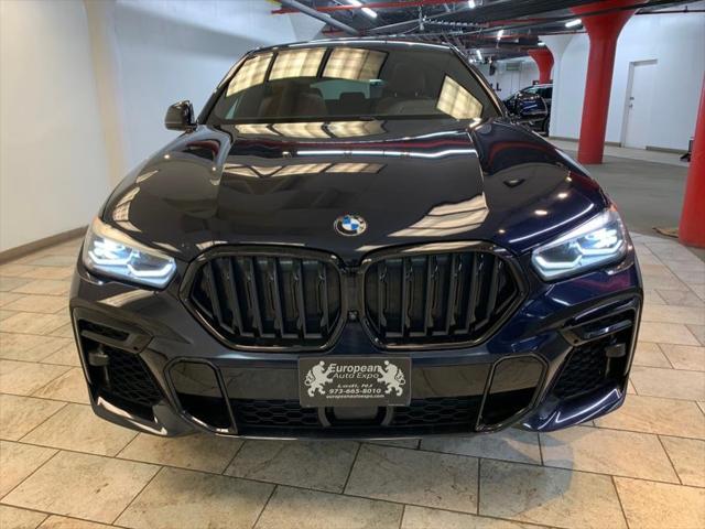 used 2022 BMW X6 car, priced at $58,477