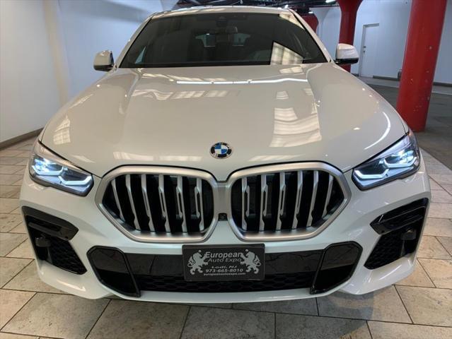 used 2022 BMW X6 car, priced at $57,477