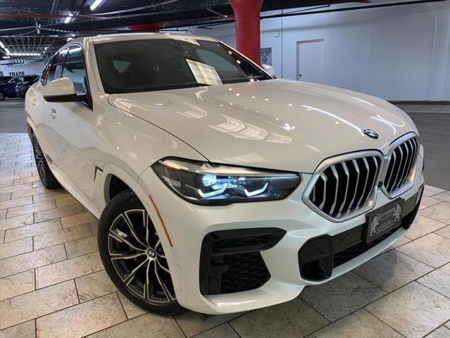 used 2022 BMW X6 car, priced at $57,477