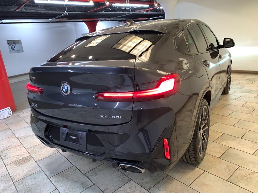 used 2023 BMW X4 car, priced at $37,477
