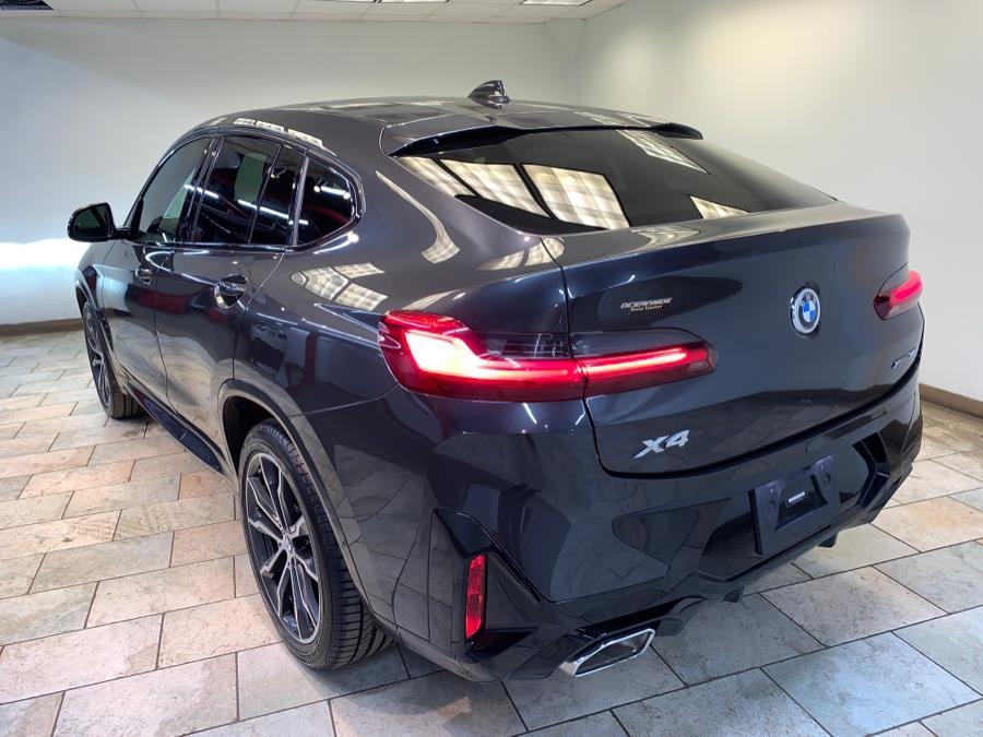 used 2023 BMW X4 car, priced at $37,477