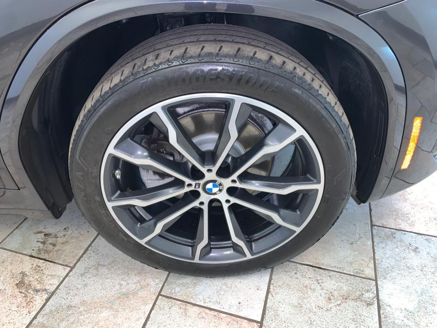 used 2023 BMW X4 car, priced at $37,477