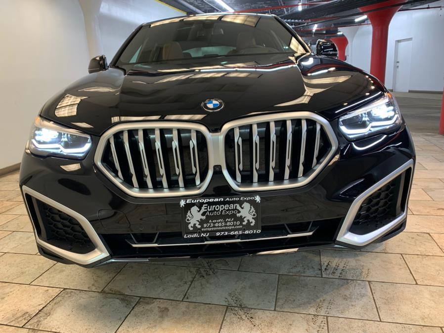 used 2023 BMW X6 car, priced at $59,477