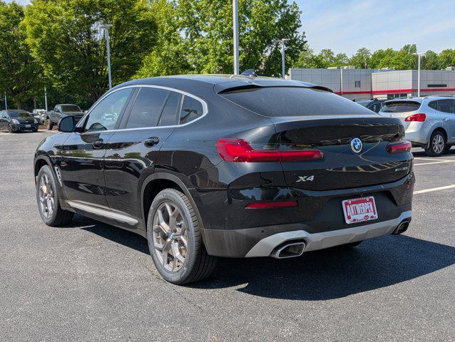 used 2022 BMW X4 car, priced at $32,185