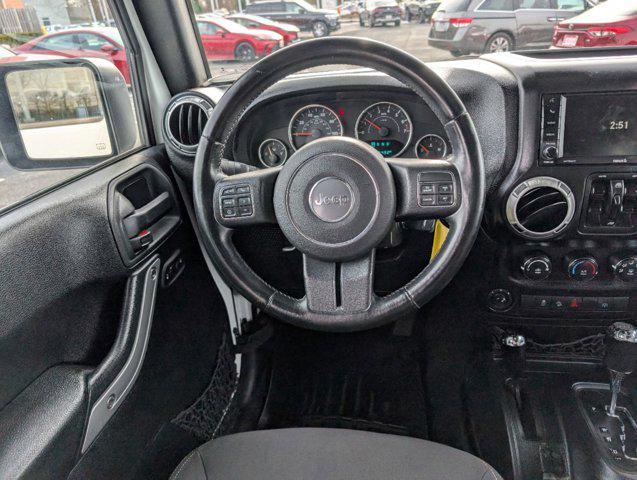 used 2015 Jeep Wrangler Unlimited car, priced at $21,190