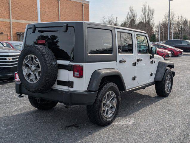 used 2015 Jeep Wrangler Unlimited car, priced at $21,190