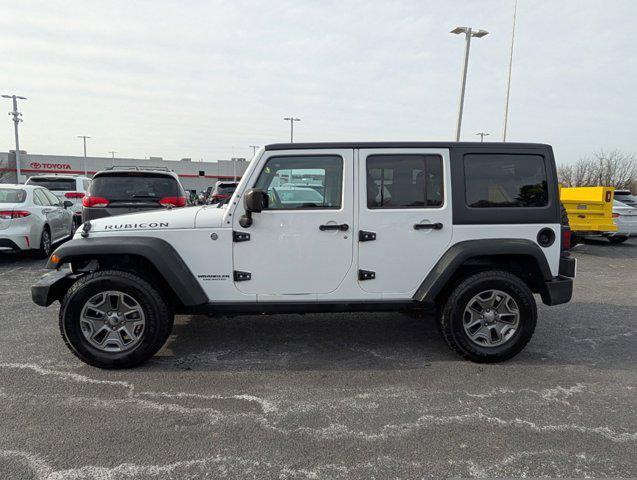 used 2015 Jeep Wrangler Unlimited car, priced at $21,190