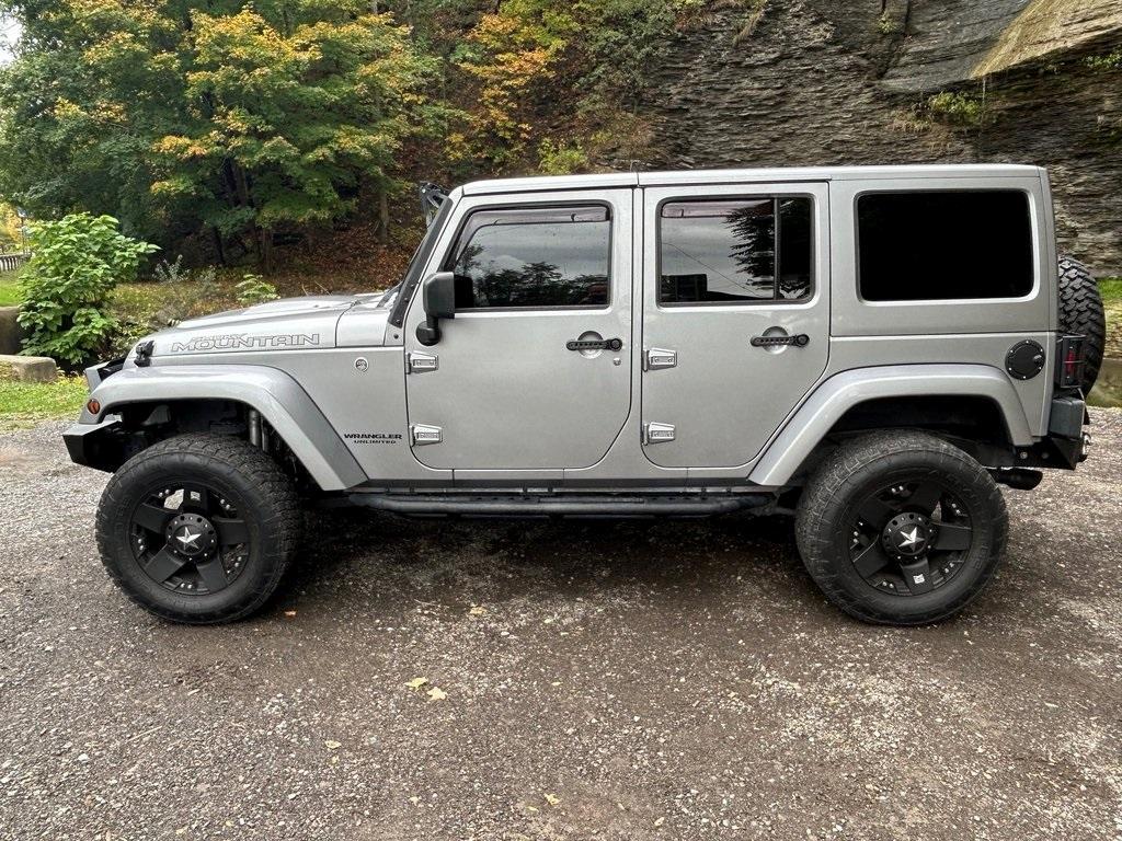 used 2017 Jeep Wrangler Unlimited car, priced at $23,999
