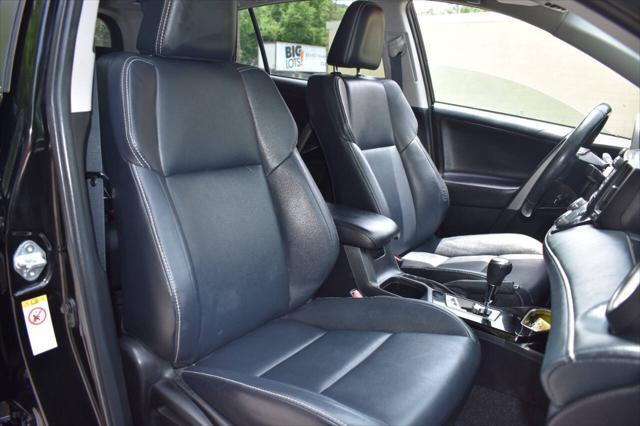 used 2018 Toyota RAV4 car, priced at $13,990