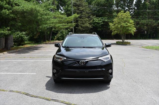 used 2018 Toyota RAV4 car, priced at $13,990