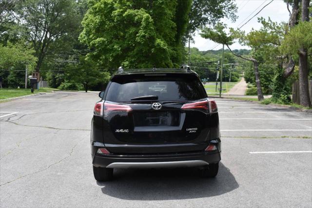 used 2018 Toyota RAV4 car, priced at $13,990