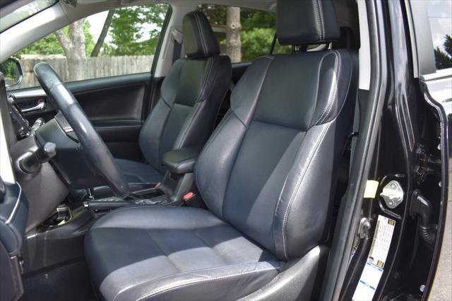 used 2018 Toyota RAV4 car, priced at $13,990