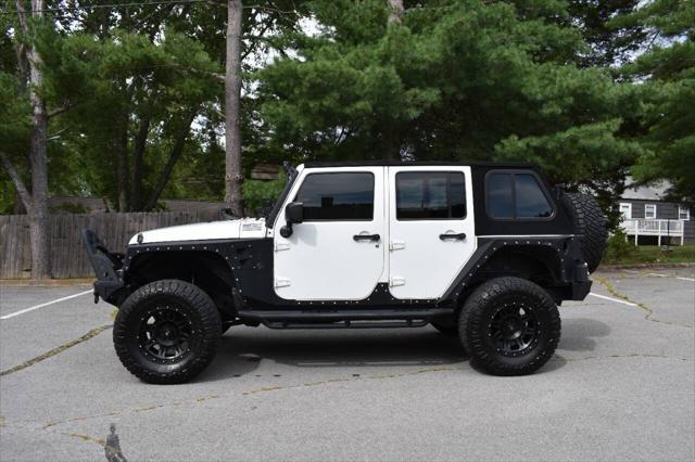 used 2014 Jeep Wrangler Unlimited car, priced at $19,990