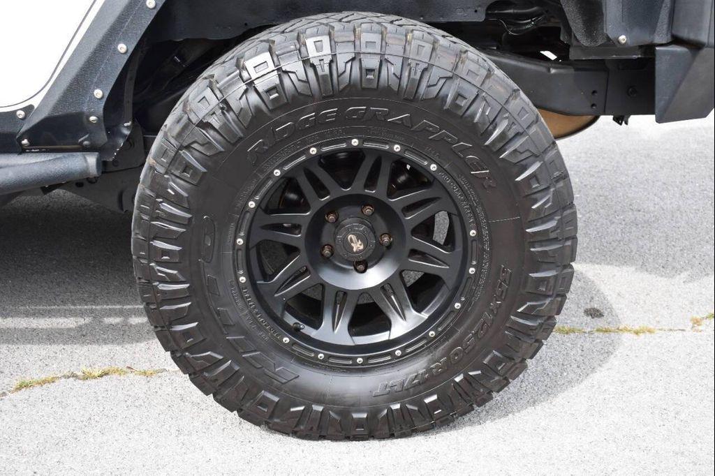 used 2014 Jeep Wrangler Unlimited car, priced at $18,990