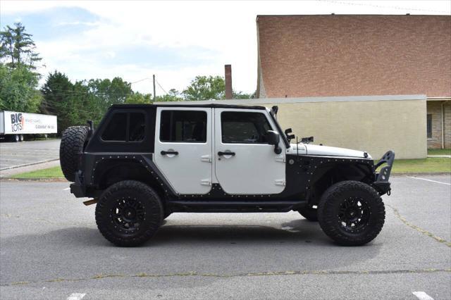 used 2014 Jeep Wrangler Unlimited car, priced at $19,990