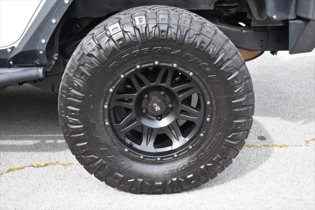 used 2014 Jeep Wrangler Unlimited car, priced at $19,990