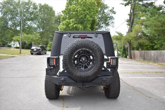 used 2014 Jeep Wrangler Unlimited car, priced at $19,990