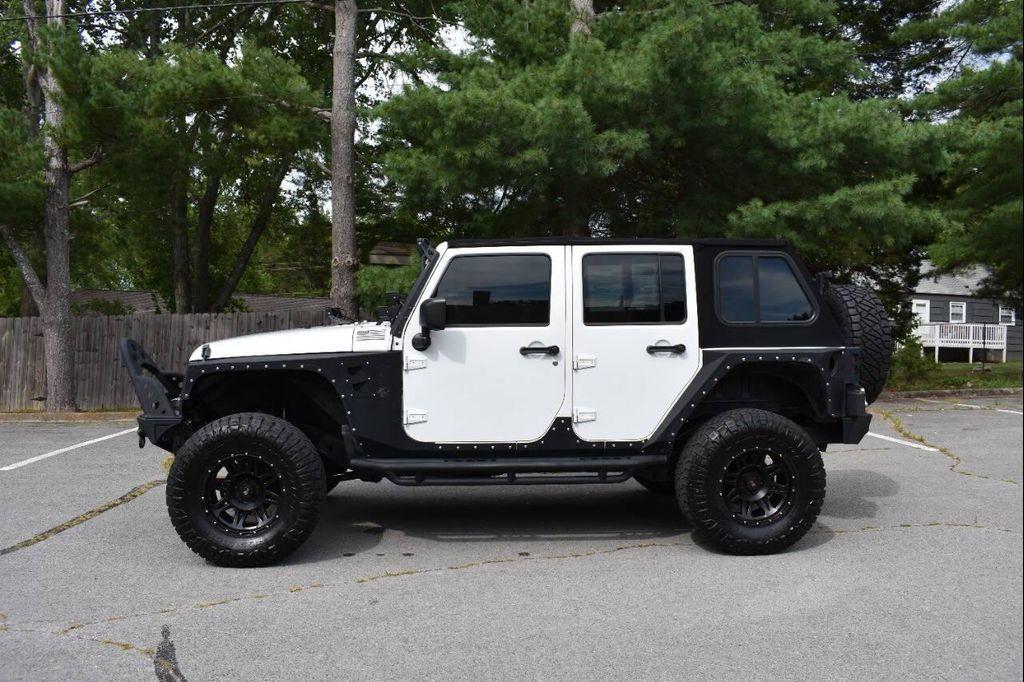 used 2014 Jeep Wrangler Unlimited car, priced at $18,990