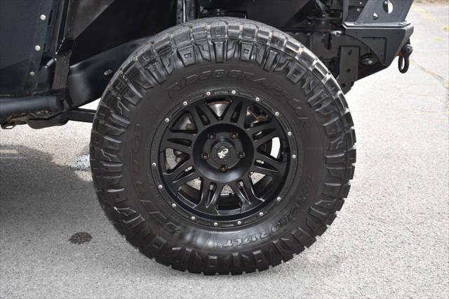 used 2014 Jeep Wrangler Unlimited car, priced at $19,990