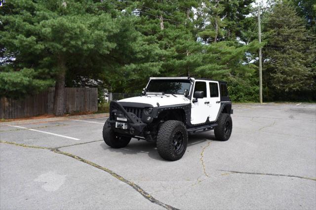 used 2014 Jeep Wrangler Unlimited car, priced at $19,990