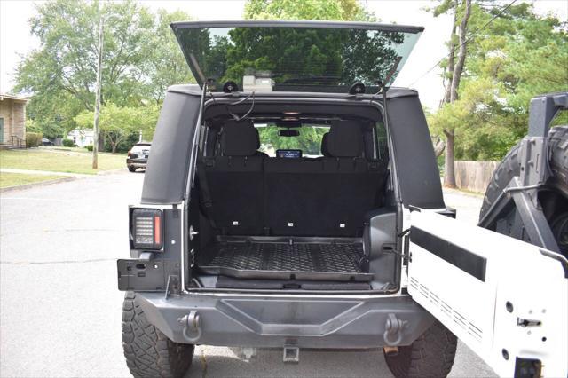 used 2014 Jeep Wrangler Unlimited car, priced at $19,990