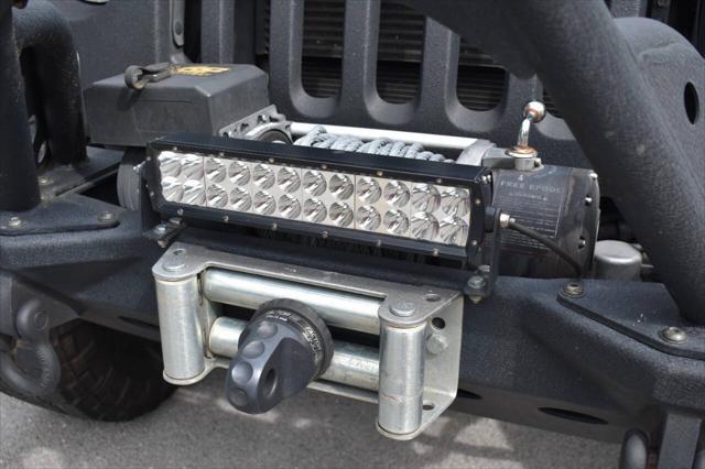 used 2014 Jeep Wrangler Unlimited car, priced at $19,990