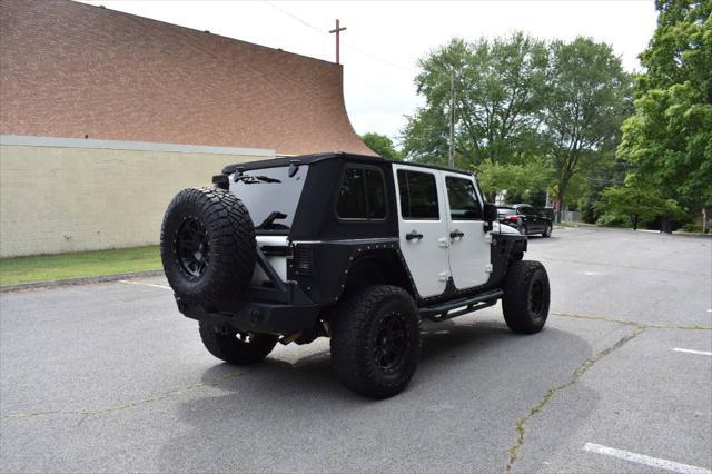 used 2014 Jeep Wrangler Unlimited car, priced at $19,990